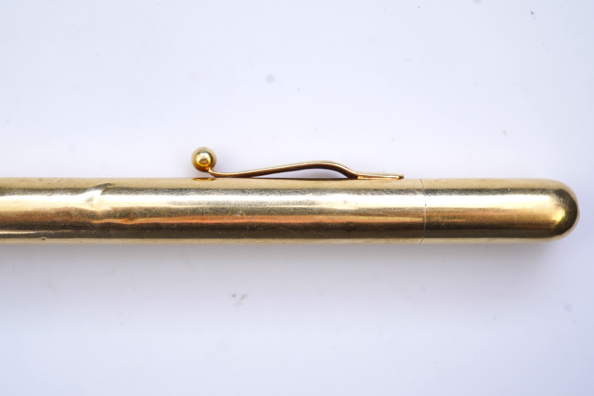 Cartier, a gold-cased propelling pencil/lighter, mid 20th century